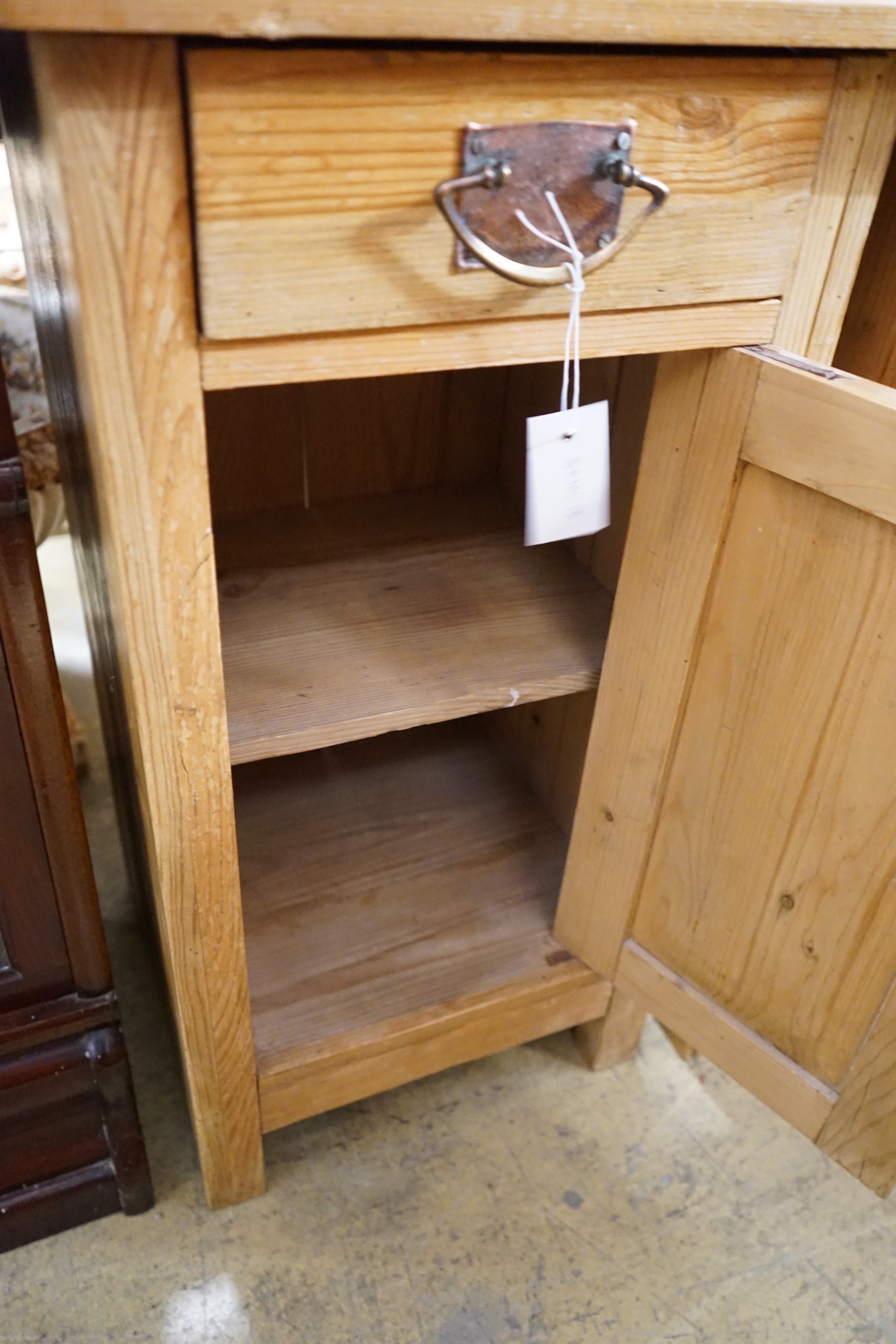 A near pair of 19th century continental pine bedside cabinets, larger width 40cm, depth 38cm, height 76cm